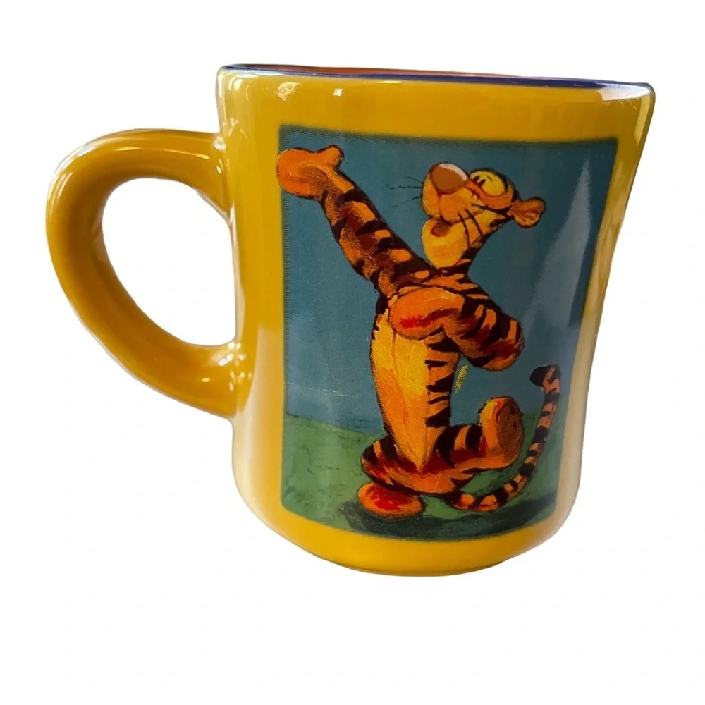The Disney Store Tigger Mug in Yellow & Orange “Base on Winnie the Pool”